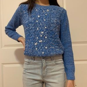 blue knitted sweater